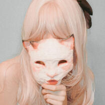 Rhea Doll with her Mask